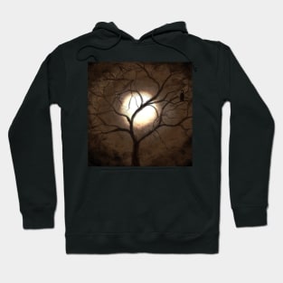 Night owl on tree branch on a spooky night with luminous moon Hoodie